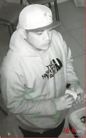 搶劫推拿店的嫌疑人之一。（美國(guó)《僑報(bào)》）
