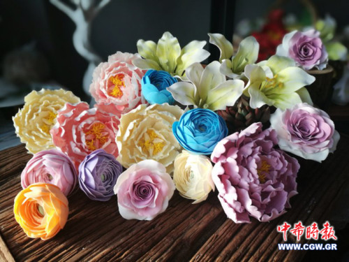 這才叫真正的“妙手生花”。（希臘《中希時(shí)報(bào)》）