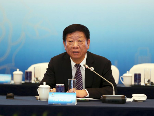 圖為人力資源和社會(huì)保障部部長(zhǎng)尹蔚民致辭。主辦方供圖