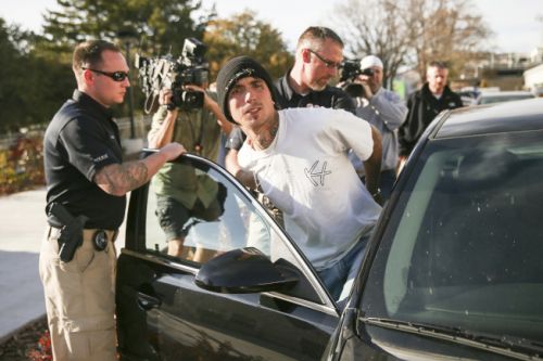 警方在鹽湖城市區(qū)公共圖書館內(nèi)被逮捕了嫌犯Austin Boutain。圖片來自美聯(lián)社