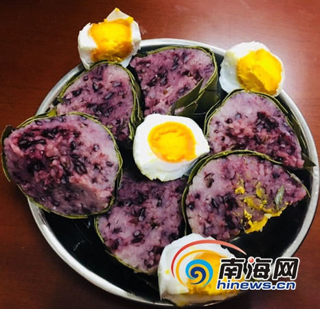 萬寧的“落”，是古萬州人對“用鳳尾草織成囊，裝米煮熟”的一種小吃的俗稱。萬寧市供圖