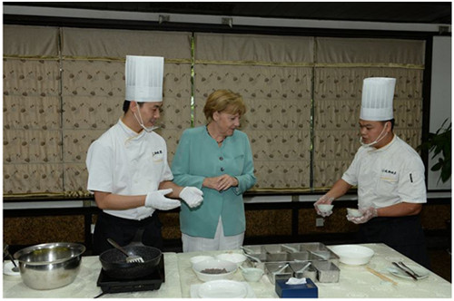 2014年，默克爾在成都川菜館。