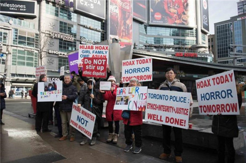 華人走上多倫多街頭游行。(加拿大環(huán)球華語電視臺供圖)