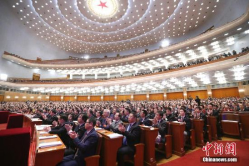 3月15日，全國政協(xié)十三屆一次會議在北京人民大會堂舉行閉幕會。列席會議的海外僑胞代表在會場就座。<a target='_blank' >中新社</a>記者 盛佳鵬 攝