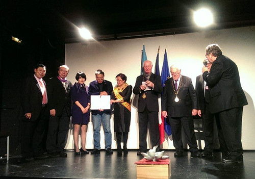 為李臺(tái)還頒獎(jiǎng)的現(xiàn)場(chǎng)。(法國(guó)《歐洲時(shí)報(bào)》/孔凡