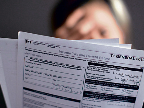 稅局絕對不會以電郵或短訊方式與納稅人聯(lián)絡(luò)。(加拿大《星島日報》)