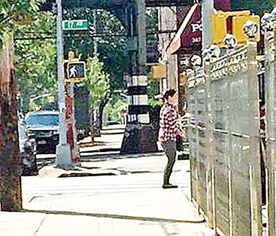 遭通緝的華裔婦女疑患有精神病。(美國《星島日報》)