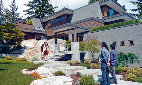 加拿大聯(lián)邦公布新措施為樓市降溫。(加拿大《星島日報(bào)》