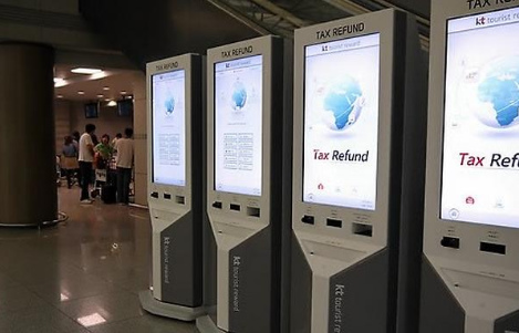 中國僑網(wǎng)仁川機場內(nèi)的自助機器。(韓國亞洲經(jīng)濟中文網(wǎng))