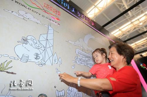 中國(guó)僑網(wǎng)天津“華博會(huì)”香港回歸20周年展區(qū)(北方網(wǎng))