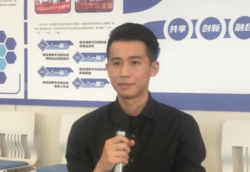 中國僑網(wǎng)在廣州做公務員的香港青年黃釗逸。劉冠南 攝